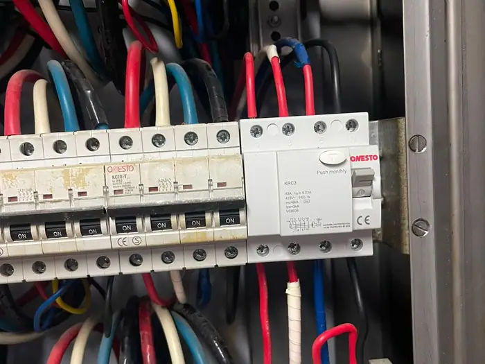Inside the board, conductors terminated